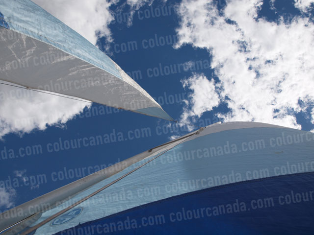 Blue and White Sails Against Sky | Cheap Stock Photo