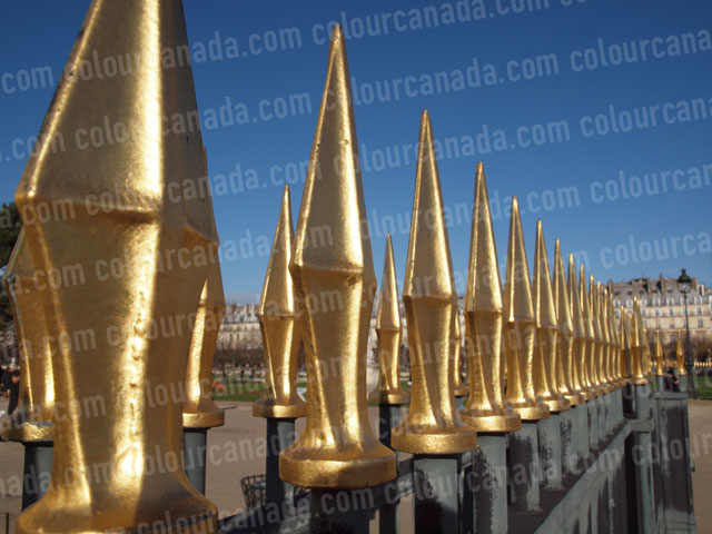 Gold Fence Spikes | Cheap Stock Photo