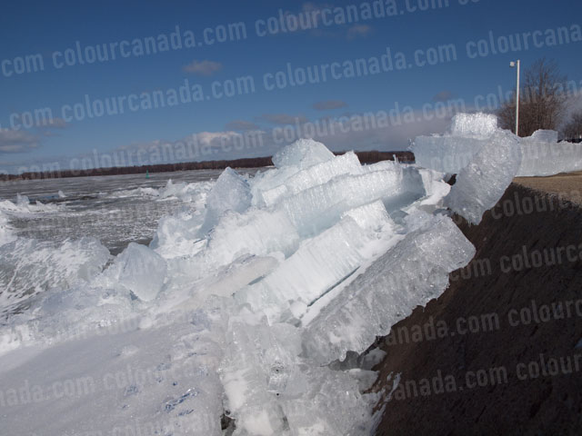Ice Piled Against a Pier in Spring | Cheap Stock Photo