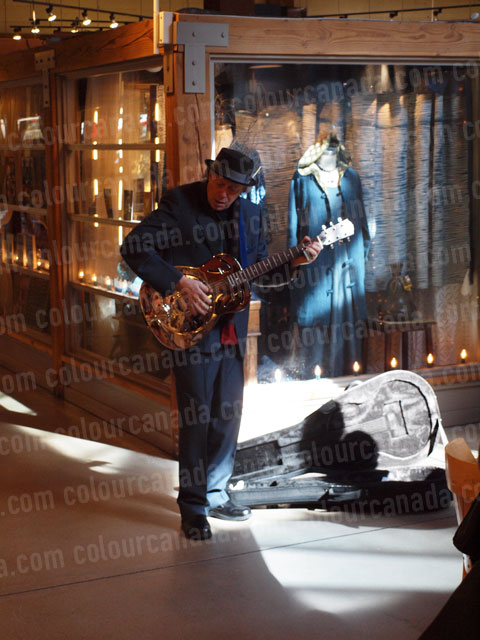 Busker Playing the Guitar | Cheap Stock Photo
