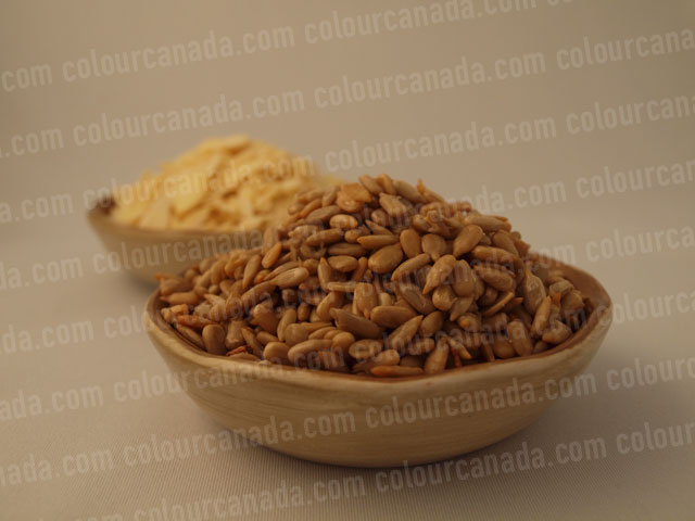 Seeds and Almonds in Bowls | Cheap Stock Photo