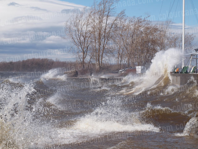 Wind and Waves Flood over Wall | Cheap Stock Photo